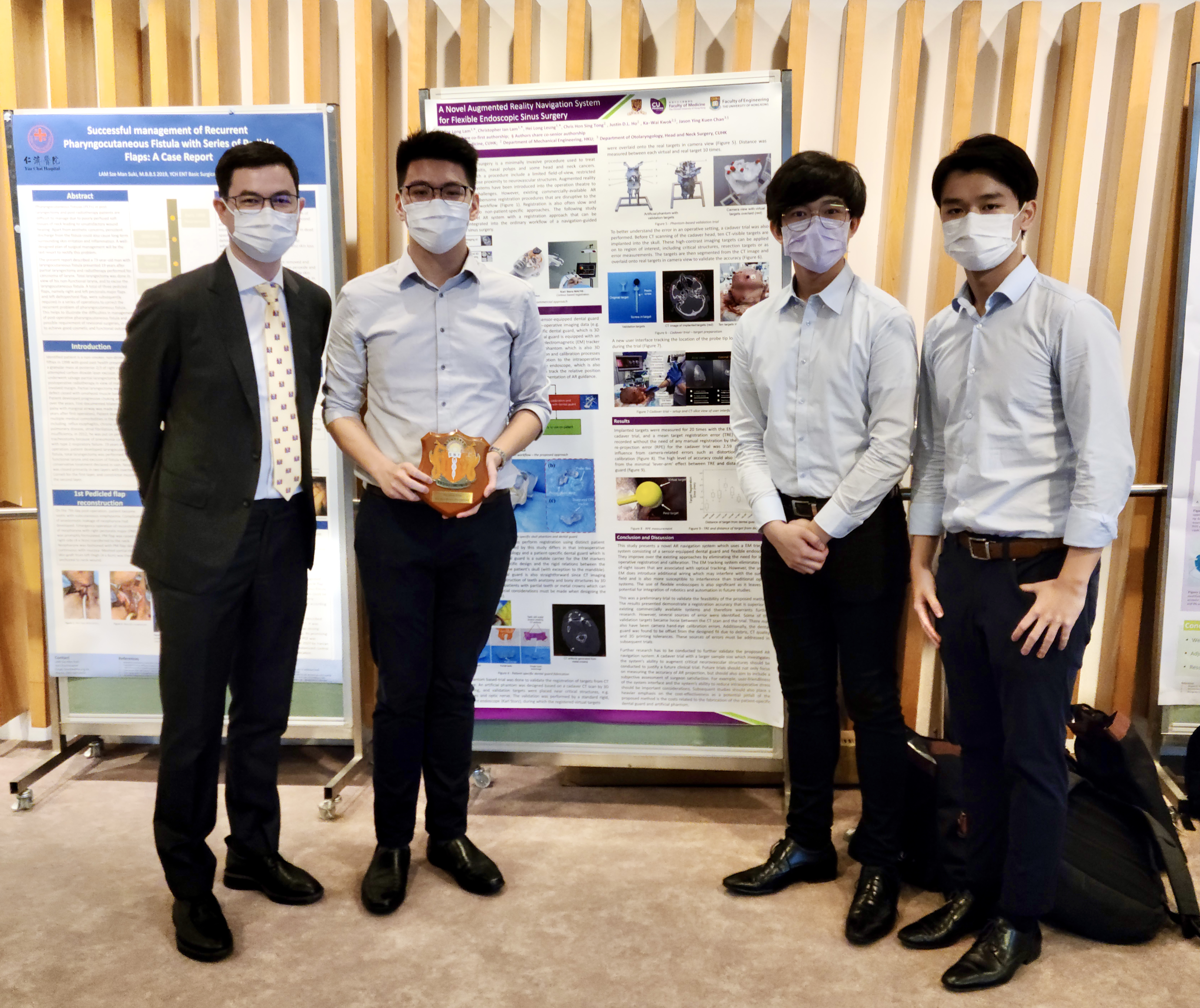 (From left) Dr Jason Chan and his three GPS Project Mentees, Marcus Leung, Brian Lam and Christopher Lam.